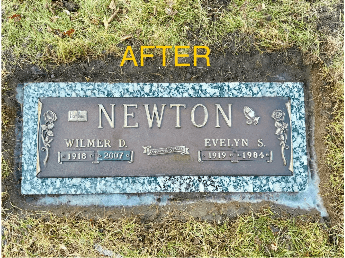 A polished bronze grave marker for Wilmer and Evelyn Newton set in a granite base.