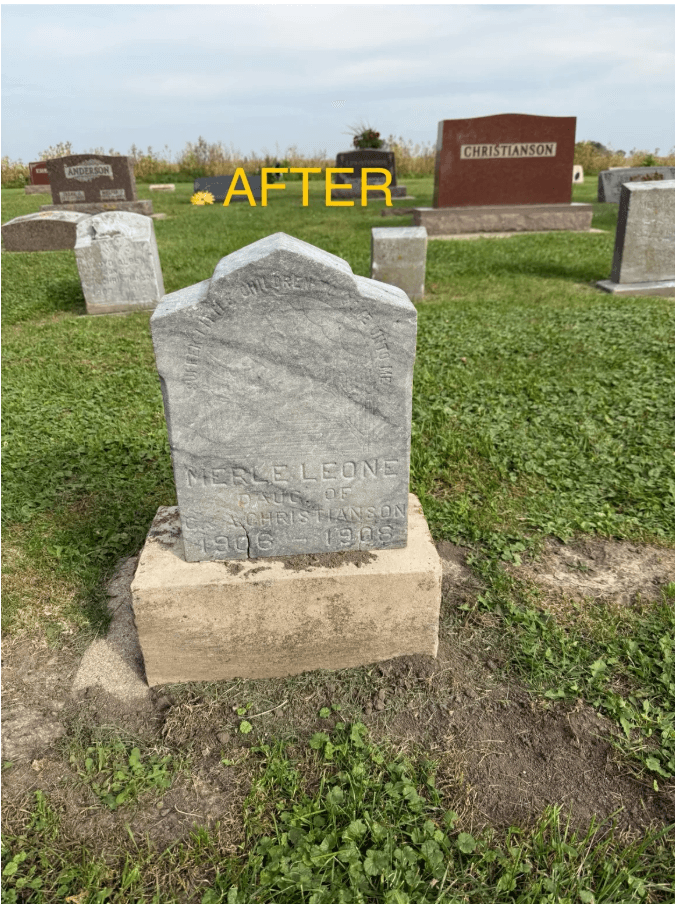 Restored grey headstone for Merle Leone Christianson, 1906-1908, standing in a grassy cemetery field.