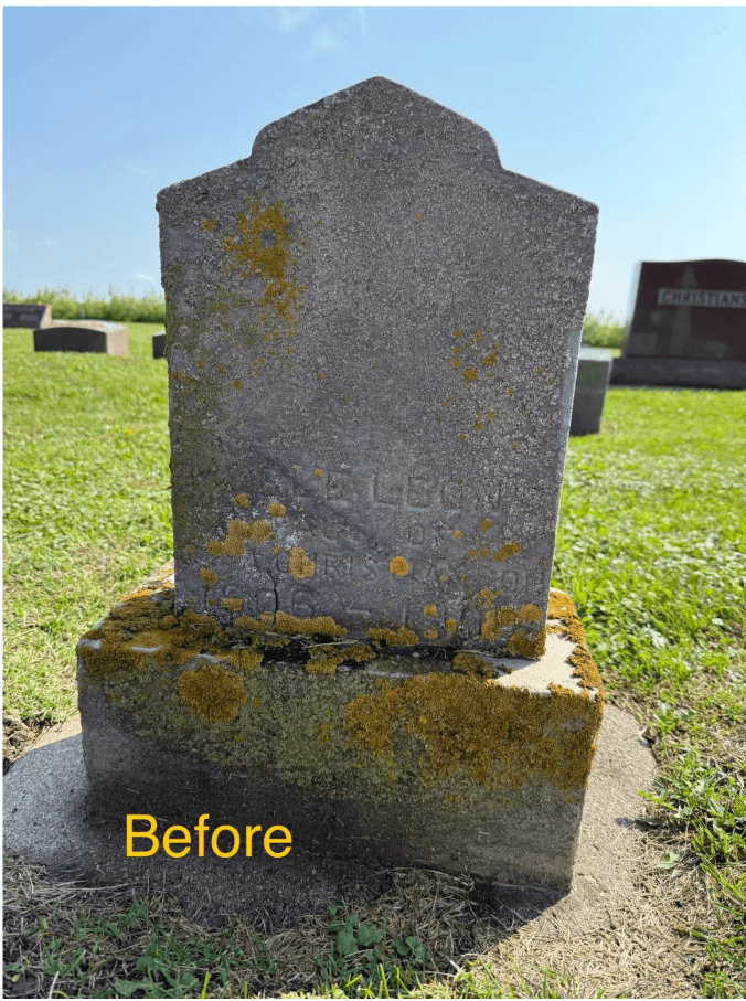Weathered, lichen-covered headstone in a grassy cemetery with yellow "Before" text overlay.